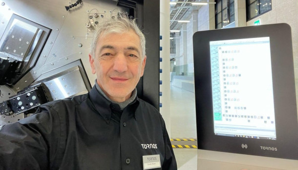 Donato Notaro in front of Tornos MultiSwiss CNC Multi-Spindle