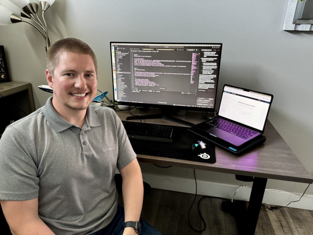 Riley Hutchinson using AI software tools to code AI for CNC